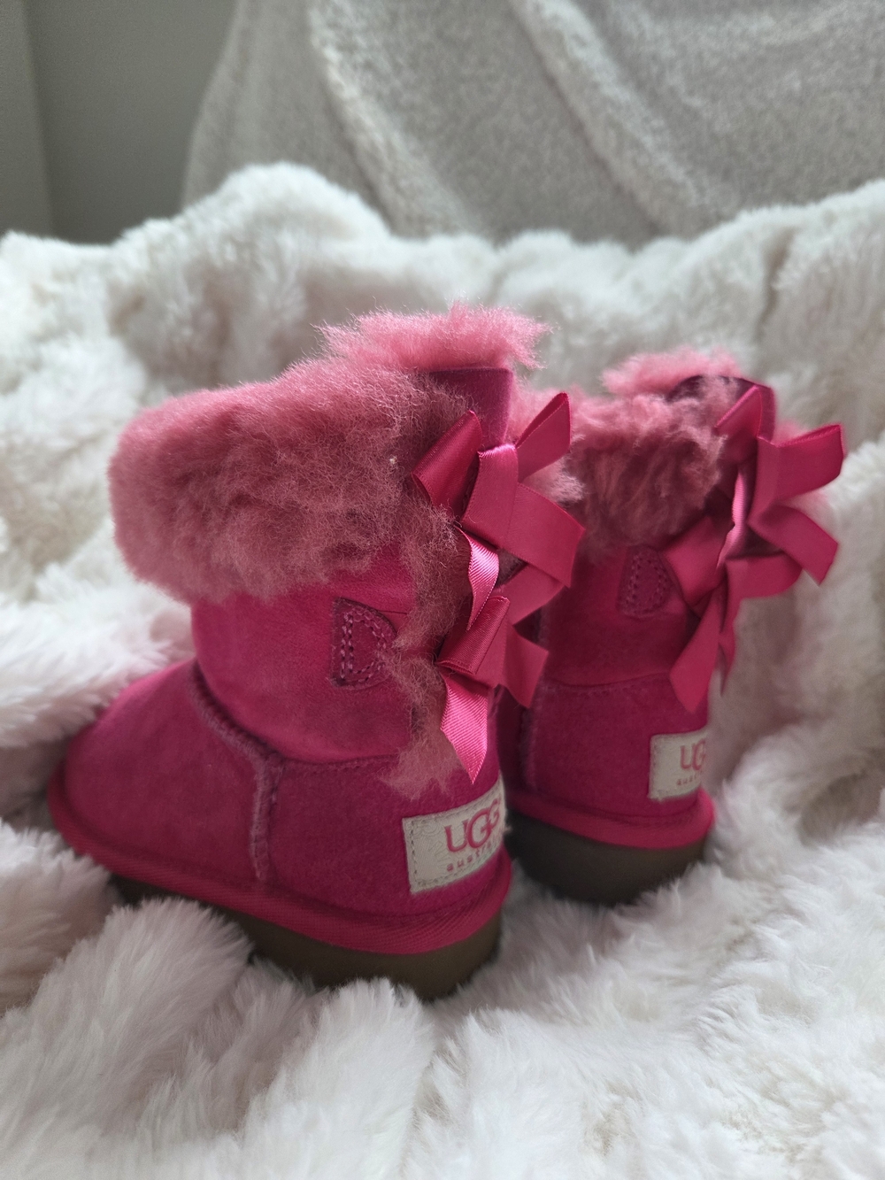 UGG Pink Shearling Bow Boots